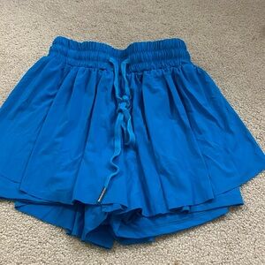 Blue butterfly athletic shorts
